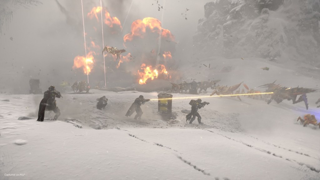 Helldivers 2: soldiers fighting in snow as explosions go off in the background.