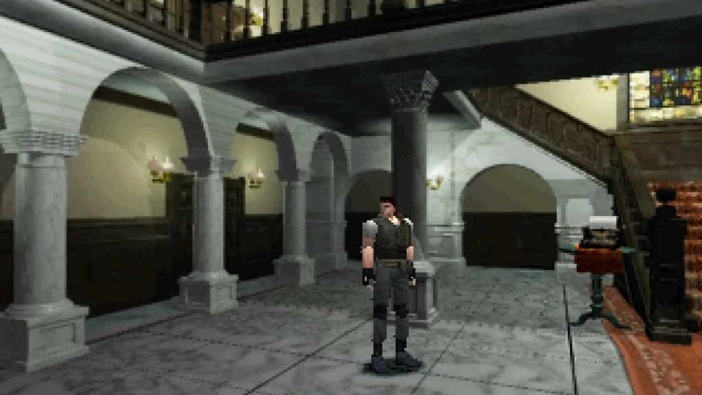 Resident Evil: Chris Redfield stood in the main hallway of the Spencer Mansion.